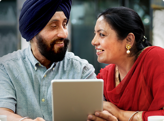 Smiling Farmers with Laptop